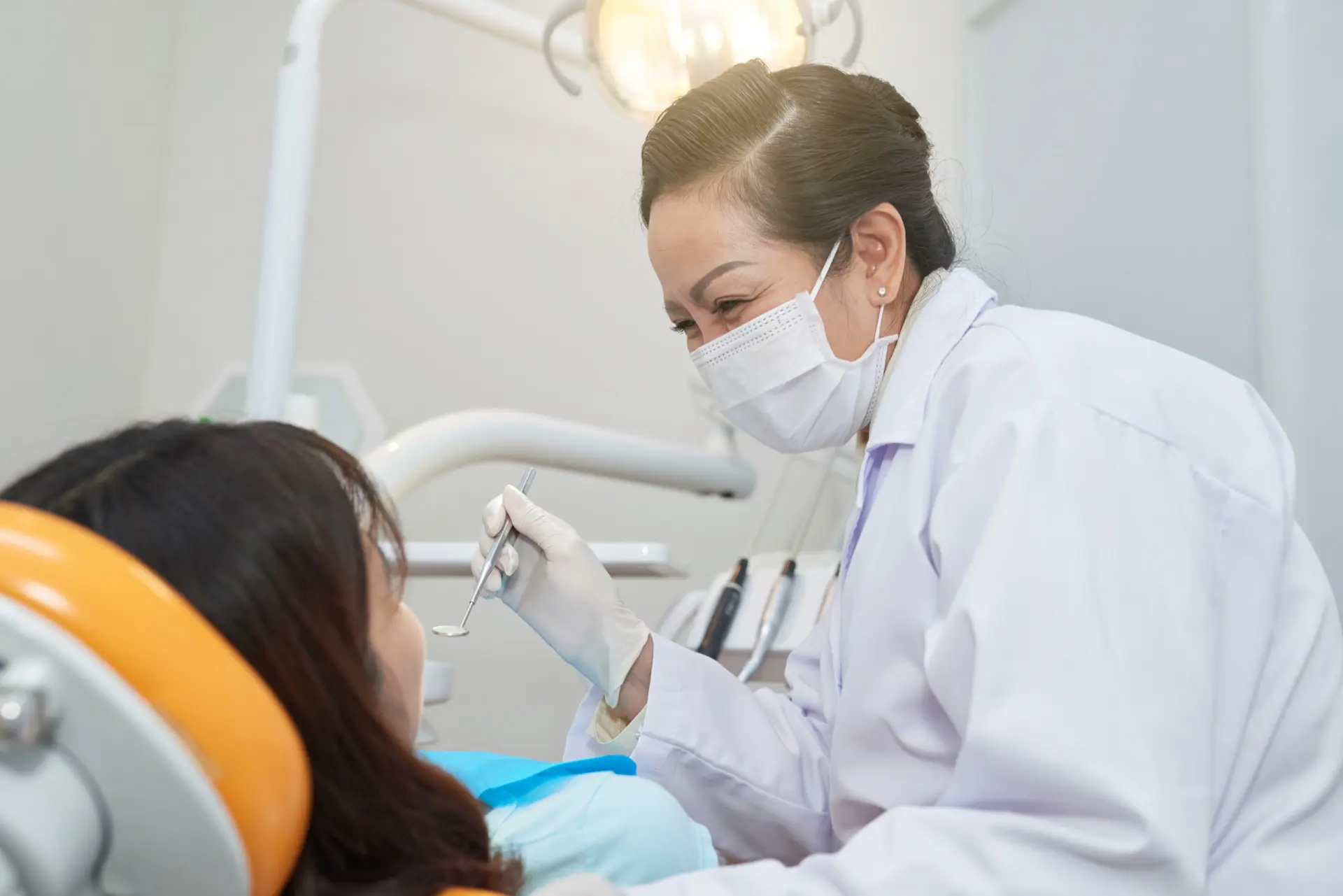 Dentist helping patient overcome dental anxiety