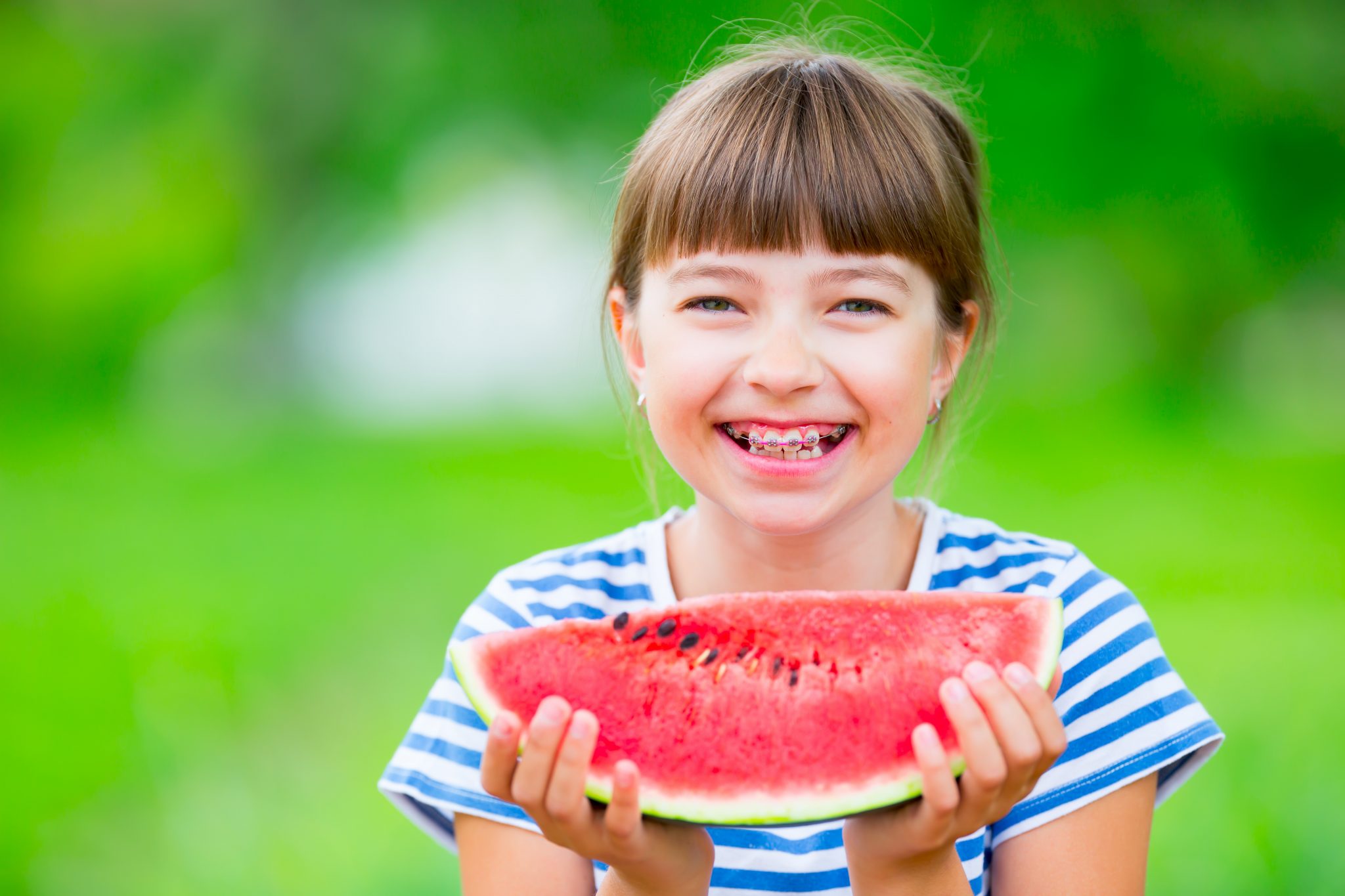 kid with braces true dental kelowna dentist office