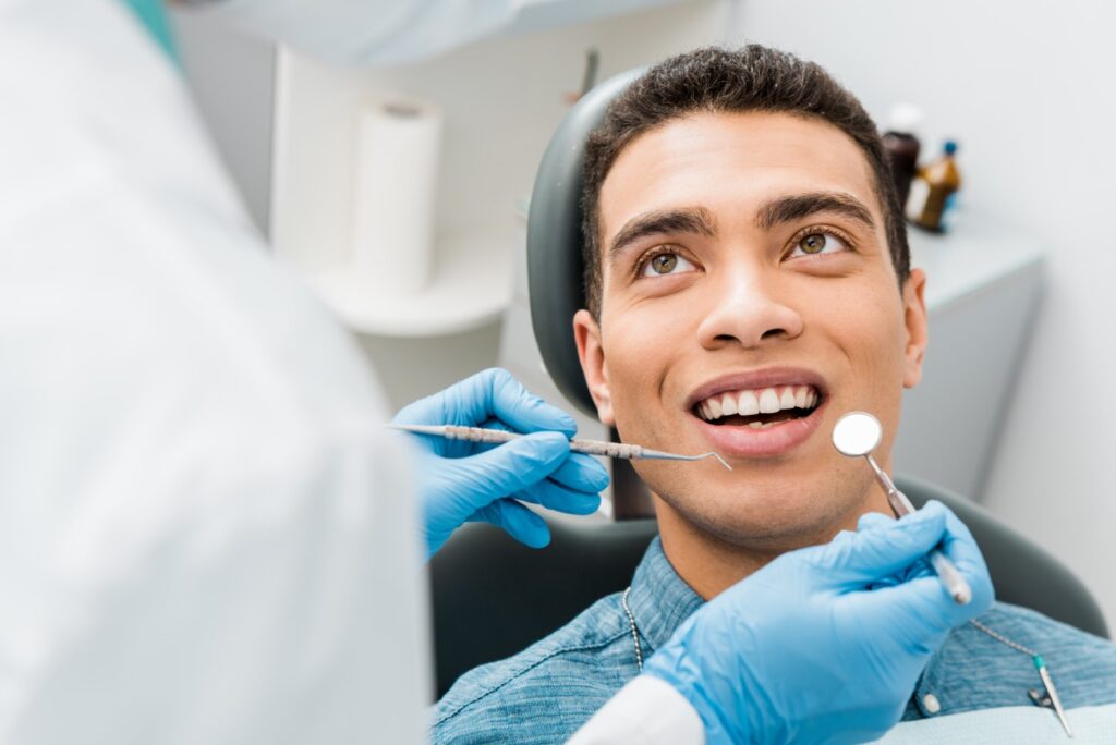 Young man having dental exam