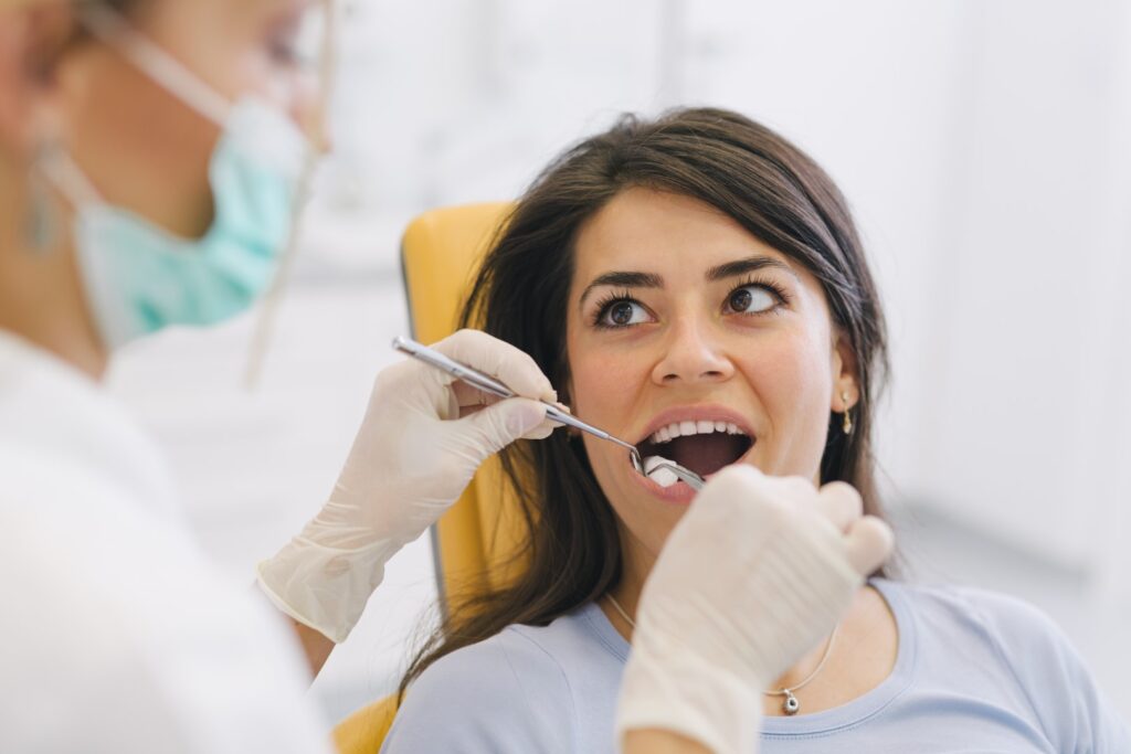 Woman having her routine dental exam