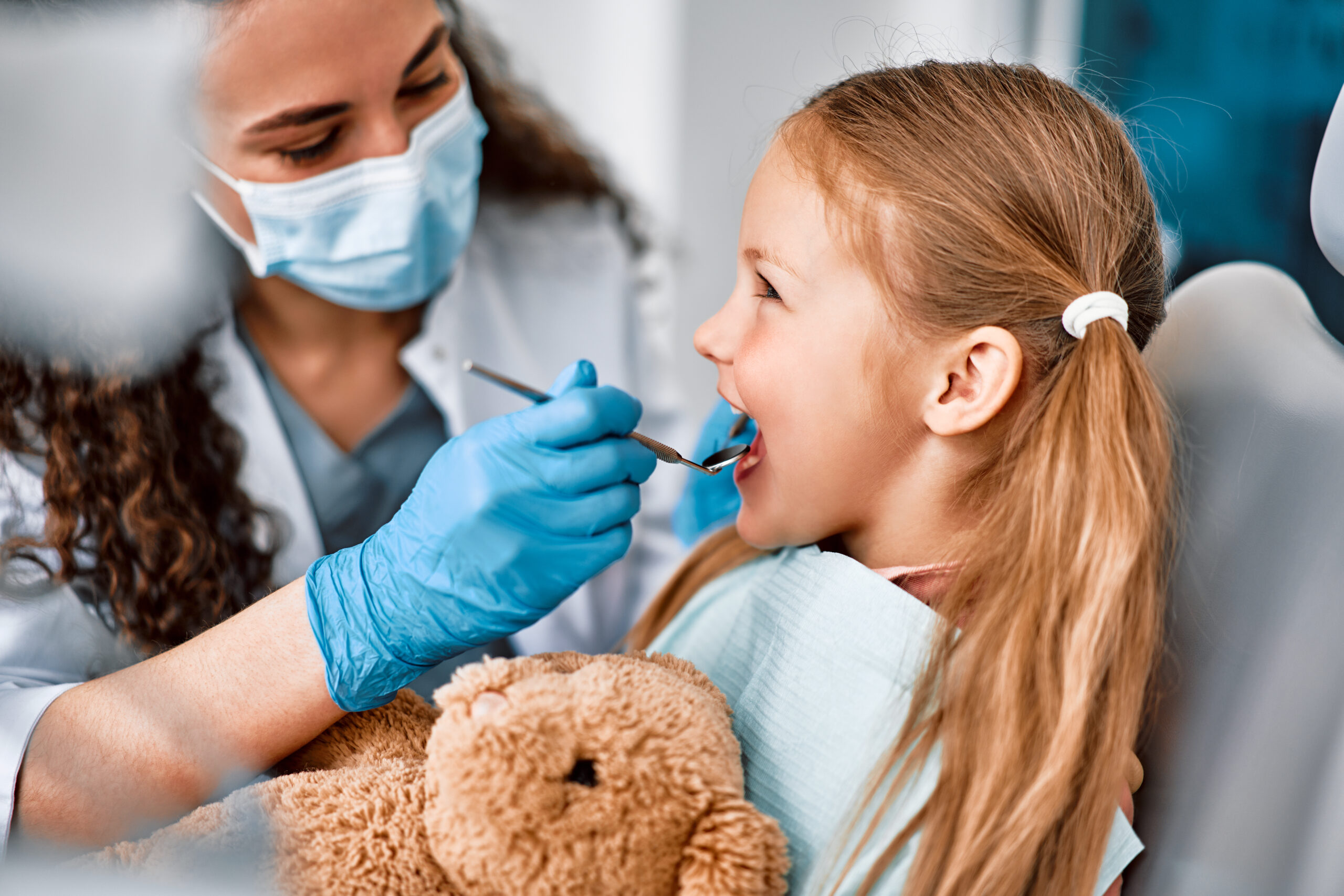 pediatric dentist with child patient in West Kelowna